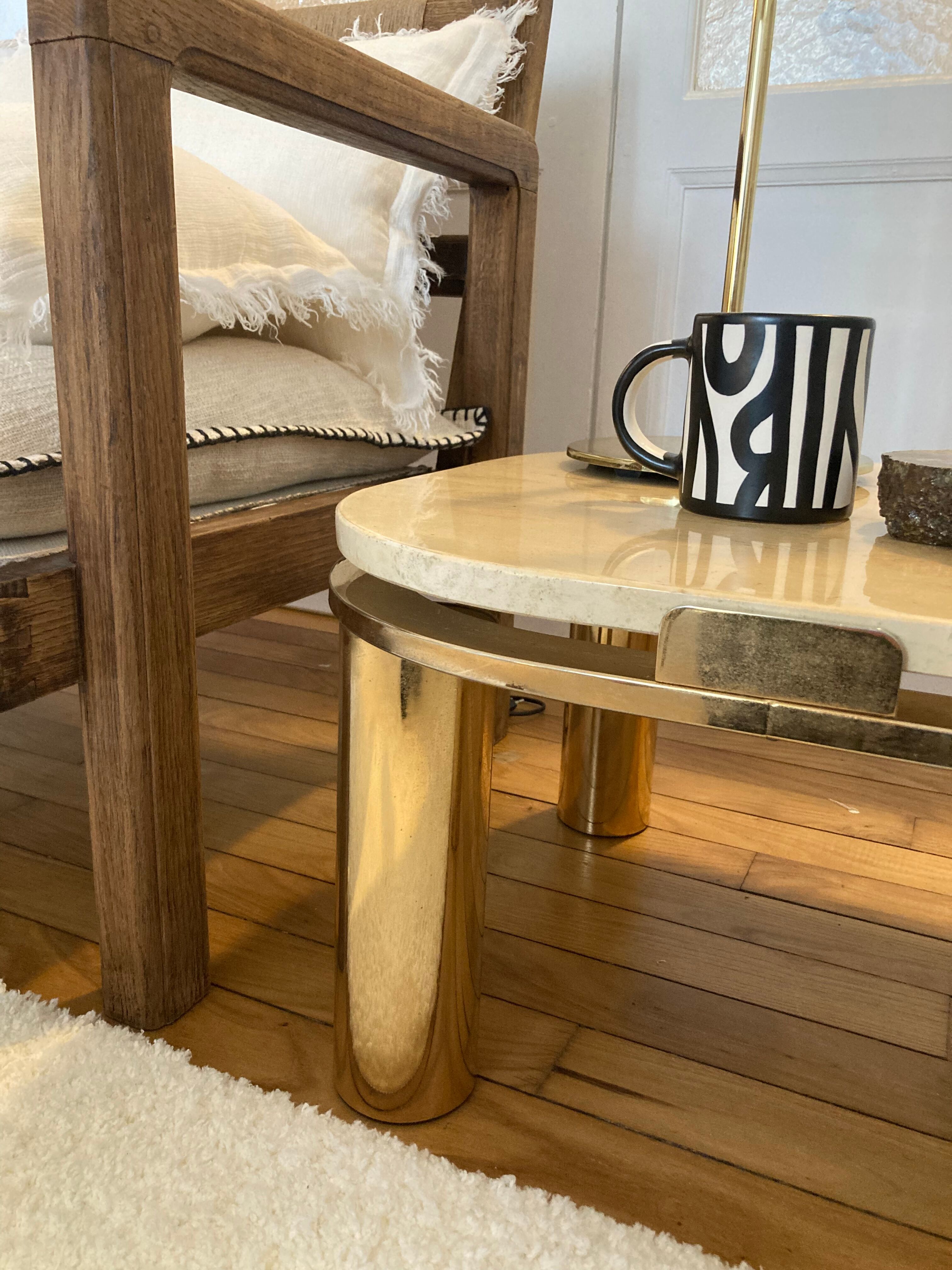 Travertine side table and vintage brass