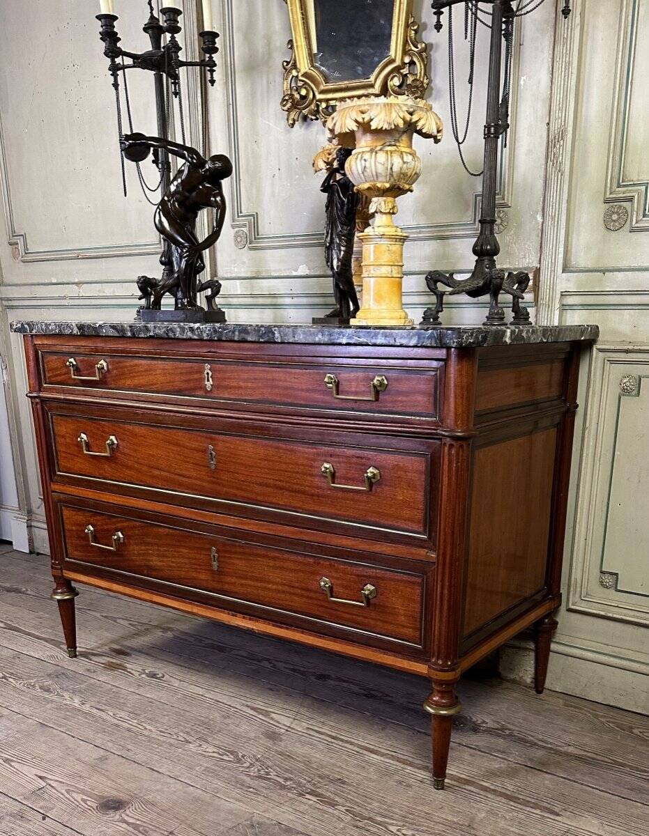 Louis XVI style mahogany commode in three colors, 18th century