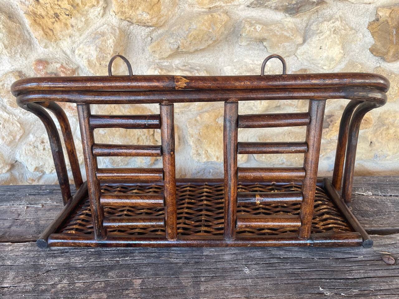 Vintage wall shelf in bamboo and rattan, circa 1960s.