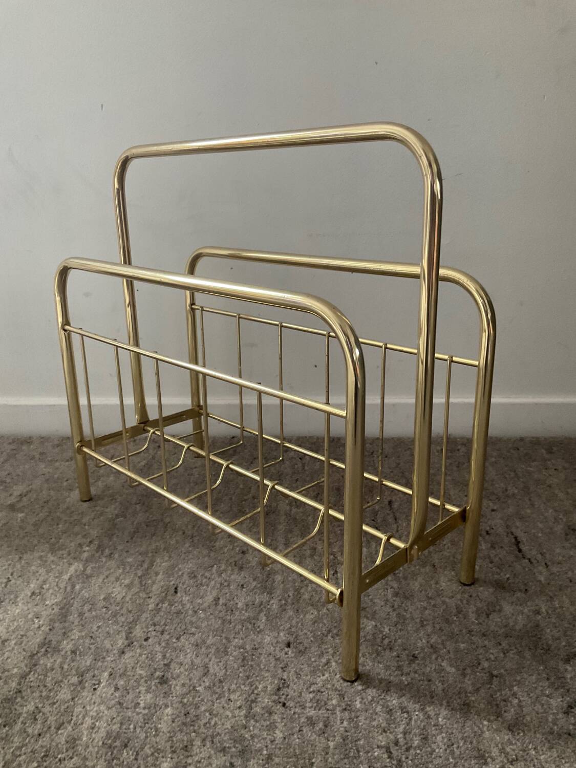 Vintage magazine holder in gold metal