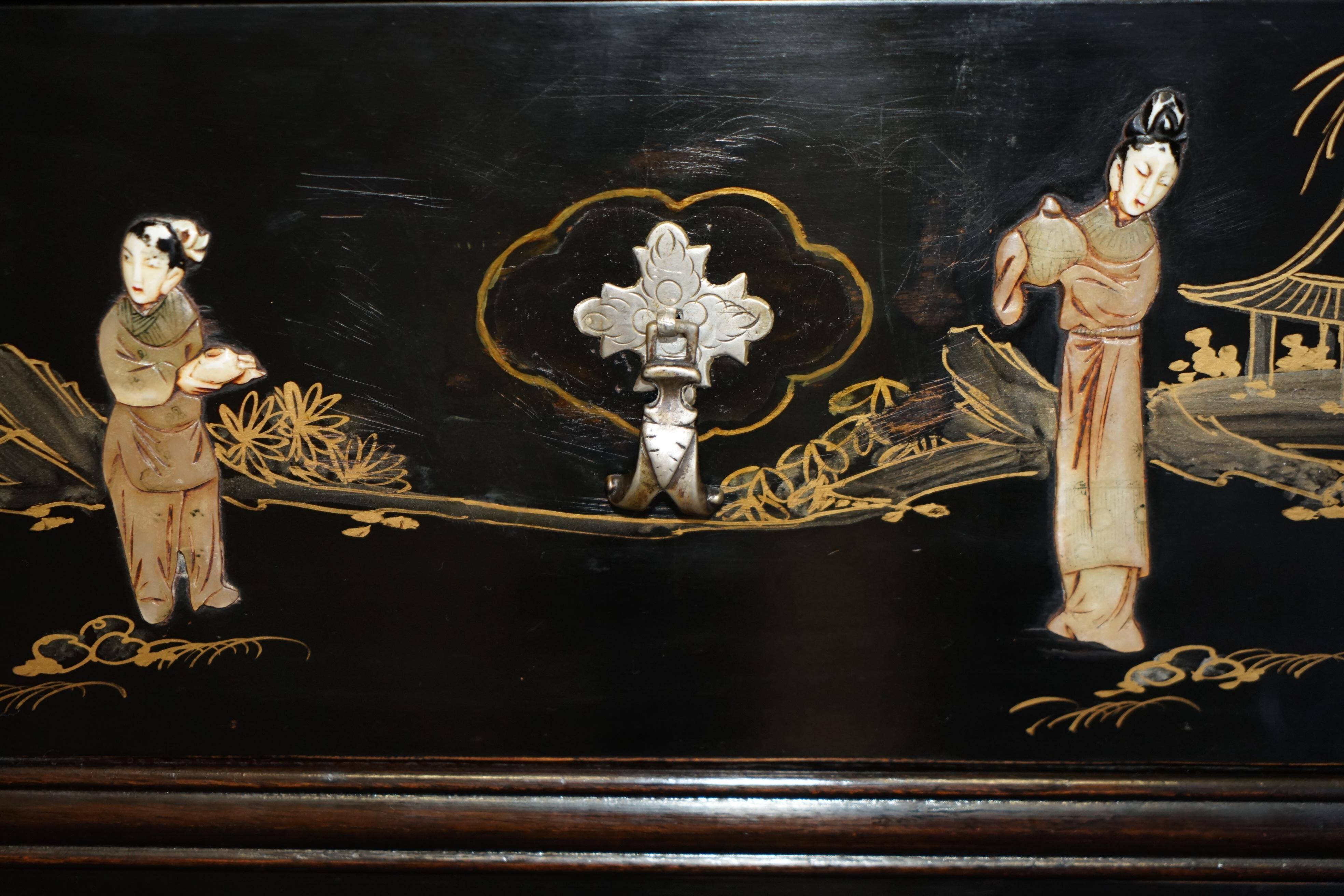 Antique Chinese commode carved in steatite with a marble top.