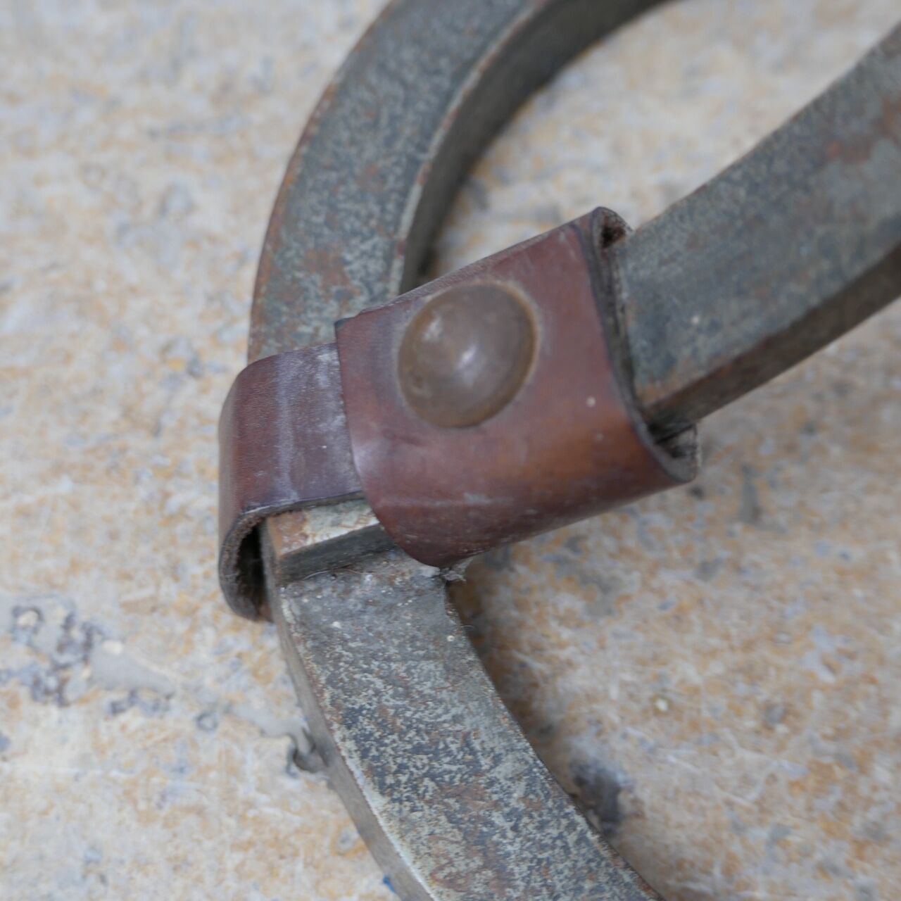 Leather and iron floor lamp by Jean-Pierre Ryckaert