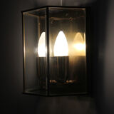 Wall sconce in brass and glass