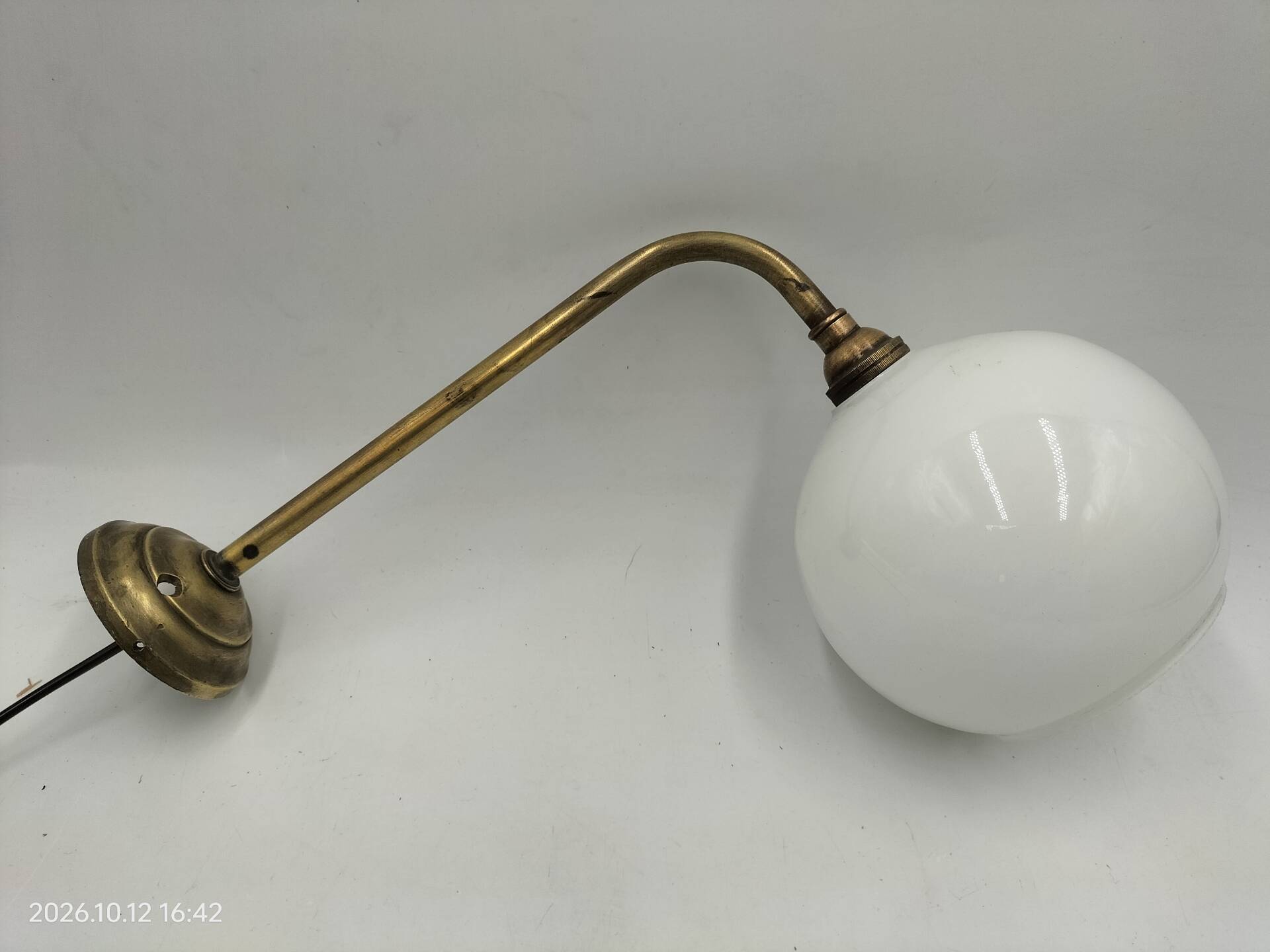 Brass and glass wall light