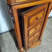 Cherry nightstand with pink marble.