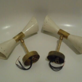 Pair of wall sconces remembering the Italian creations from the 50s and 60's