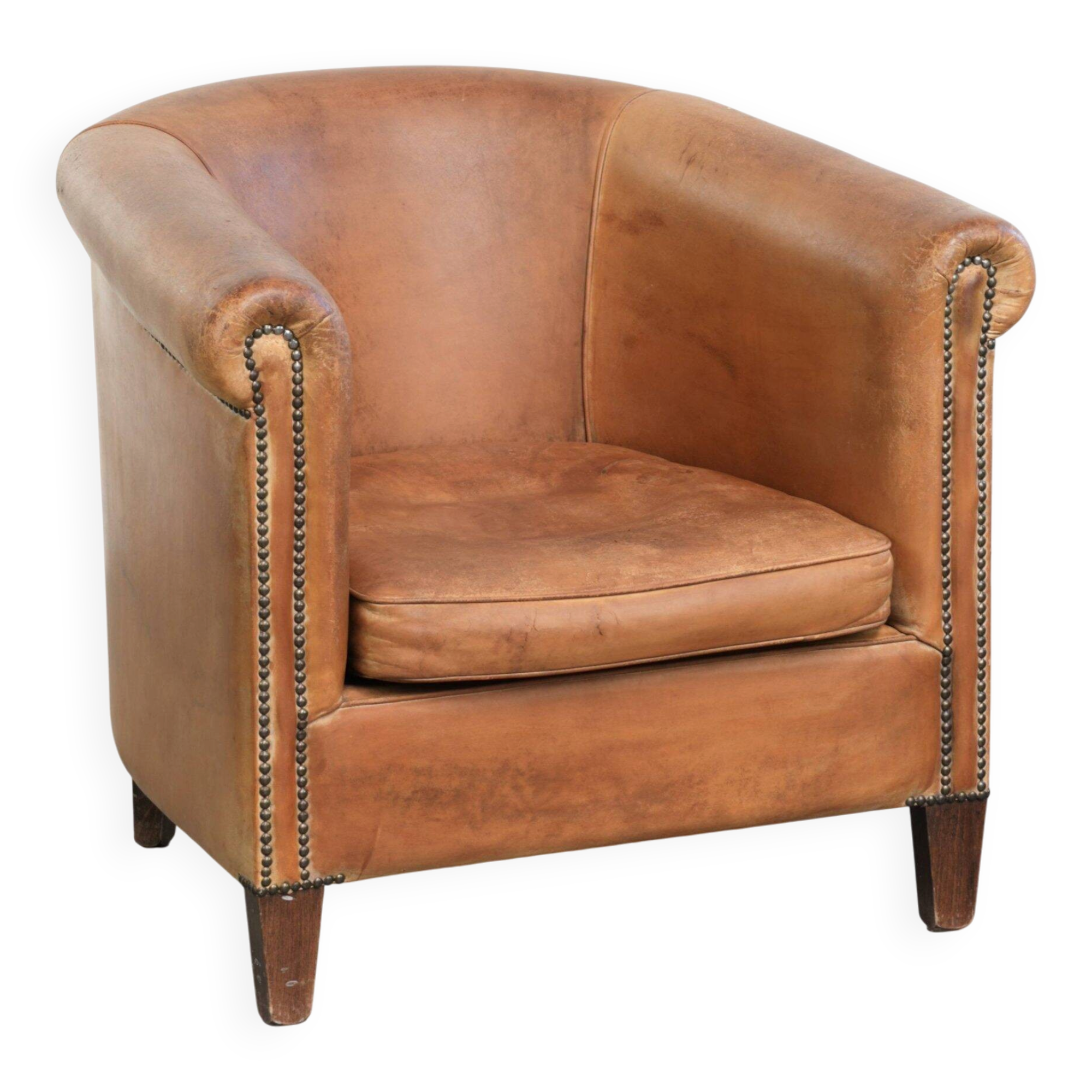 Vintage sheepskin club armchair in a beautiful light cognac colour