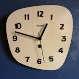 Clock formica vintage asymmetrical silent wall clock "Manufrance pale yellow"