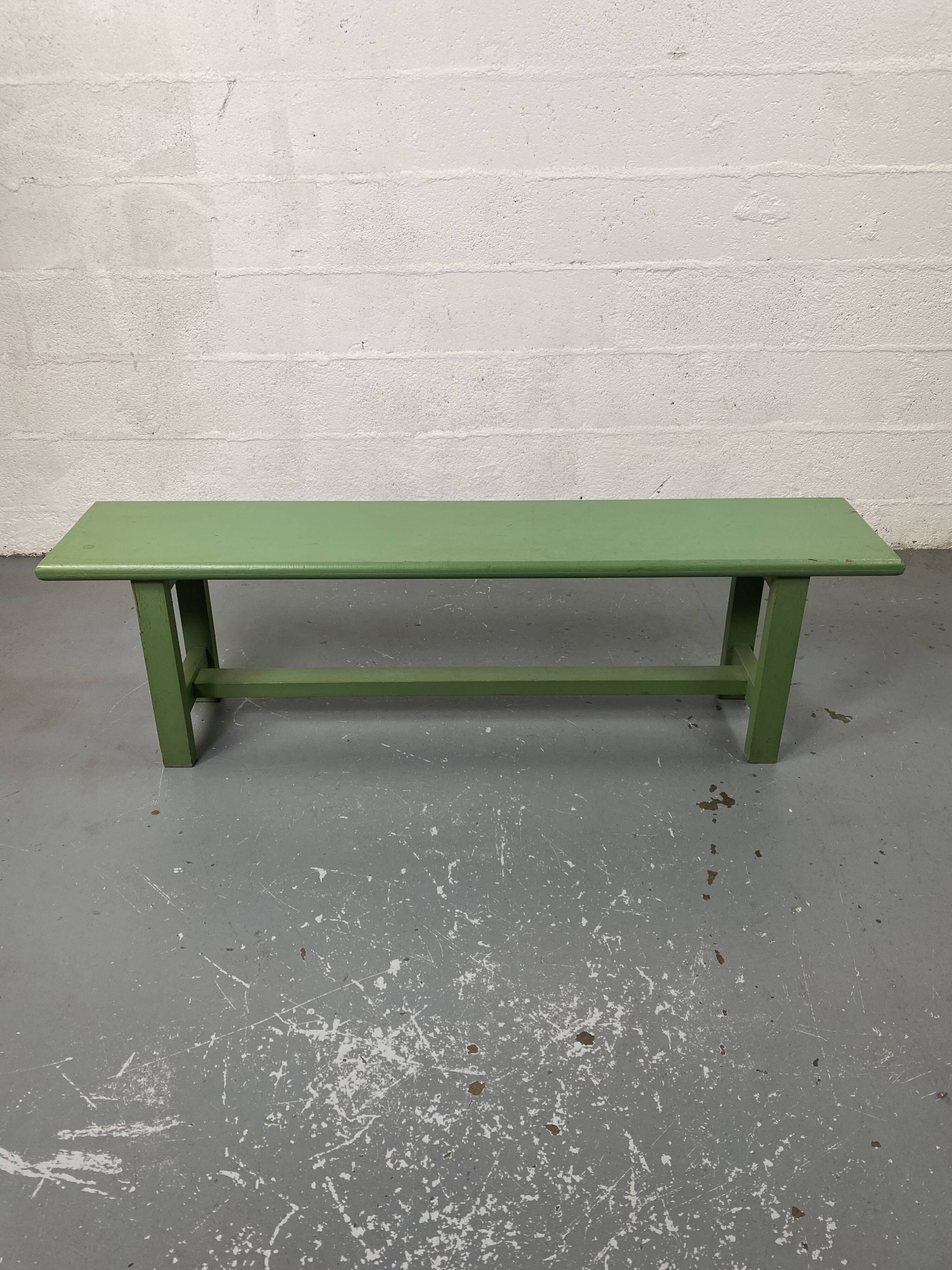 Green wooden bench