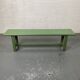 Green wooden bench