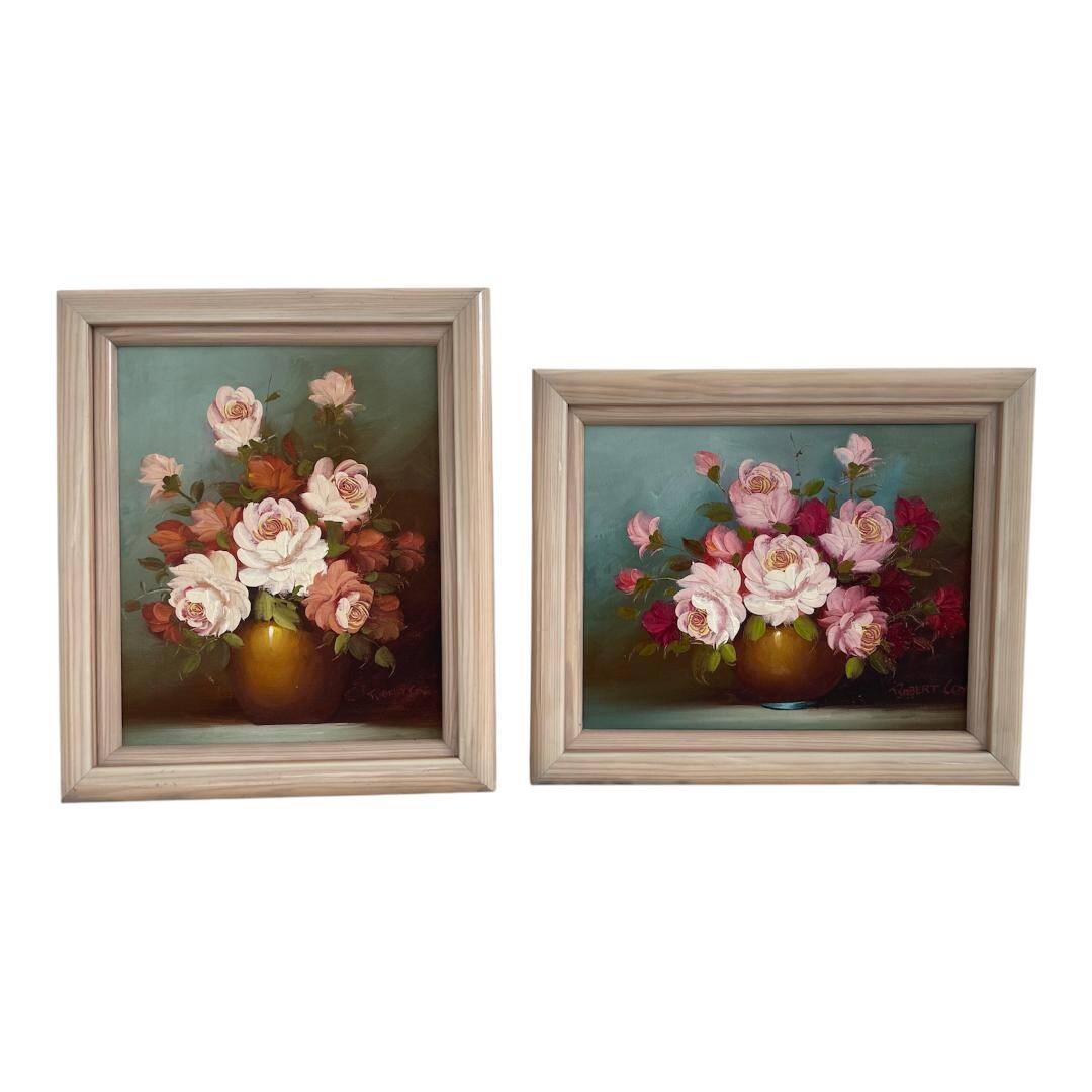 Pair of oils on canvas signed by Robert Cox, floral still lifes.