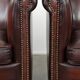 Set of two cow leather club armchairs in a luxurious red/brown colour