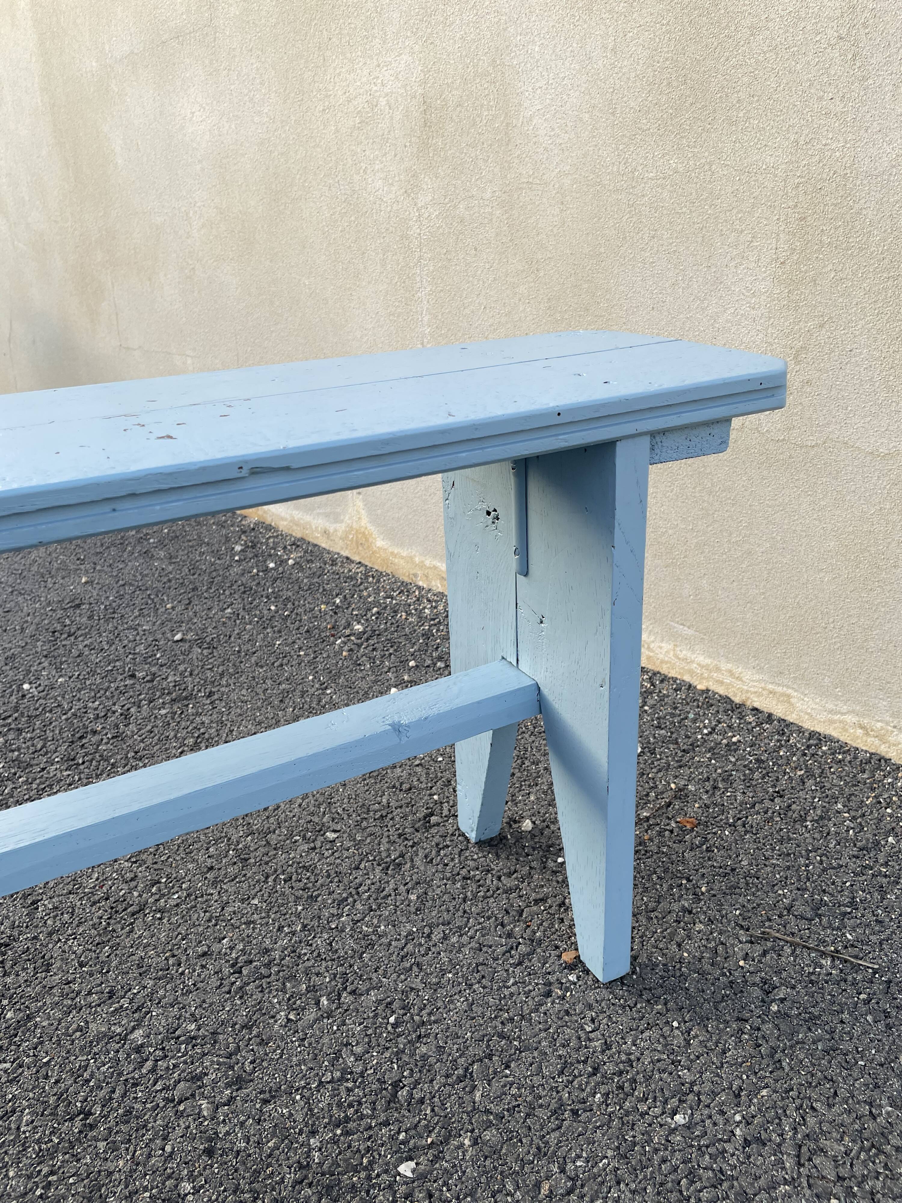 Blue painted wooden bench