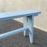 Blue painted wooden bench
