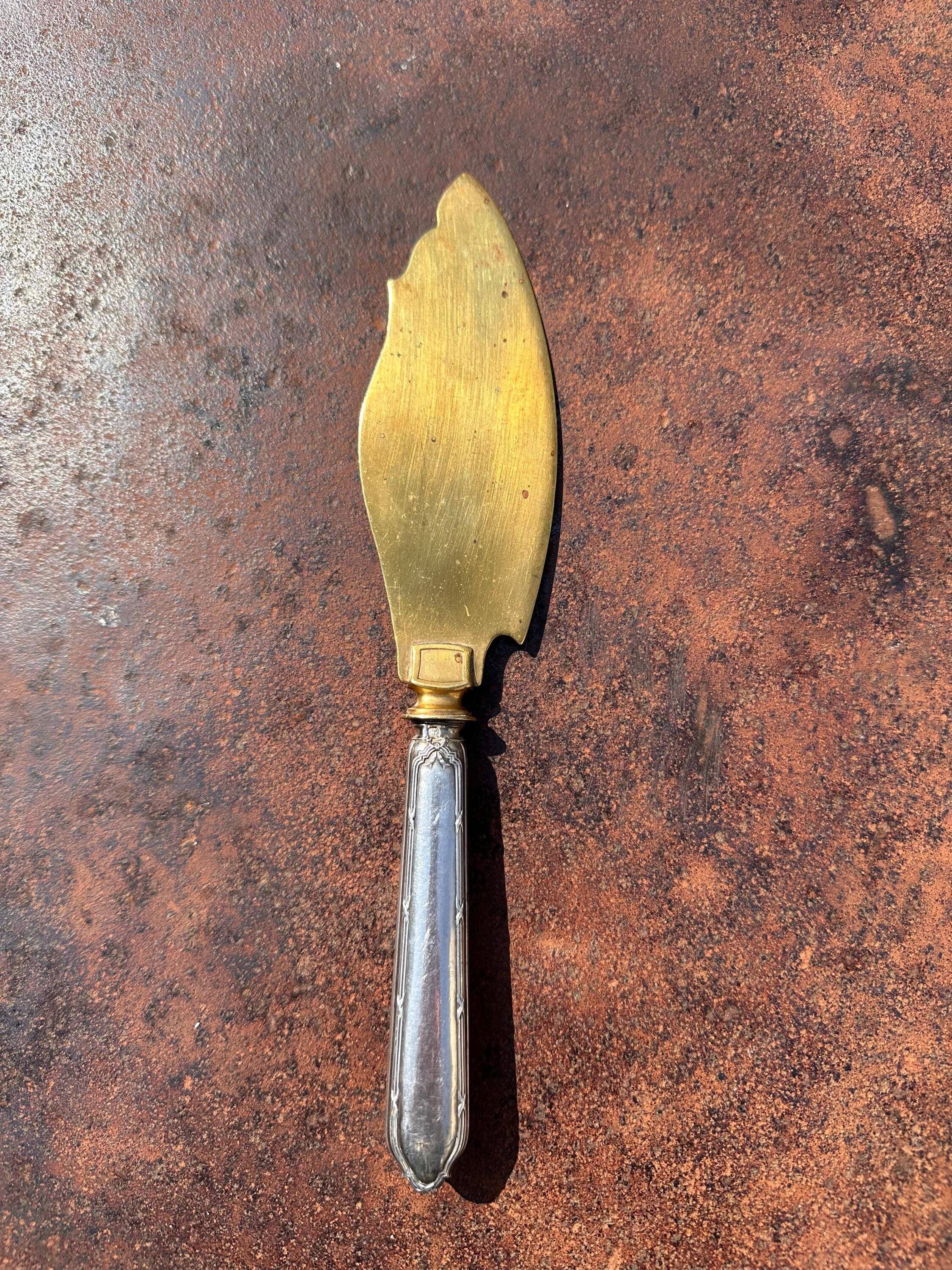 Silver-handled pie server Minerve, golden blade, Louis style.