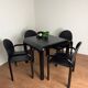 Knoll Orsay set – table & 4 chairs – black lacquered steel & faux leather