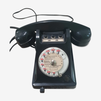 Téléphone ptt noir à cadran rotatif des années 1960