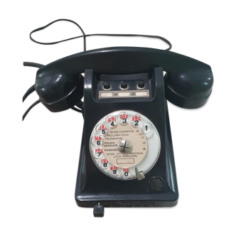 Téléphone ptt noir à cadran rotatif des années 1960