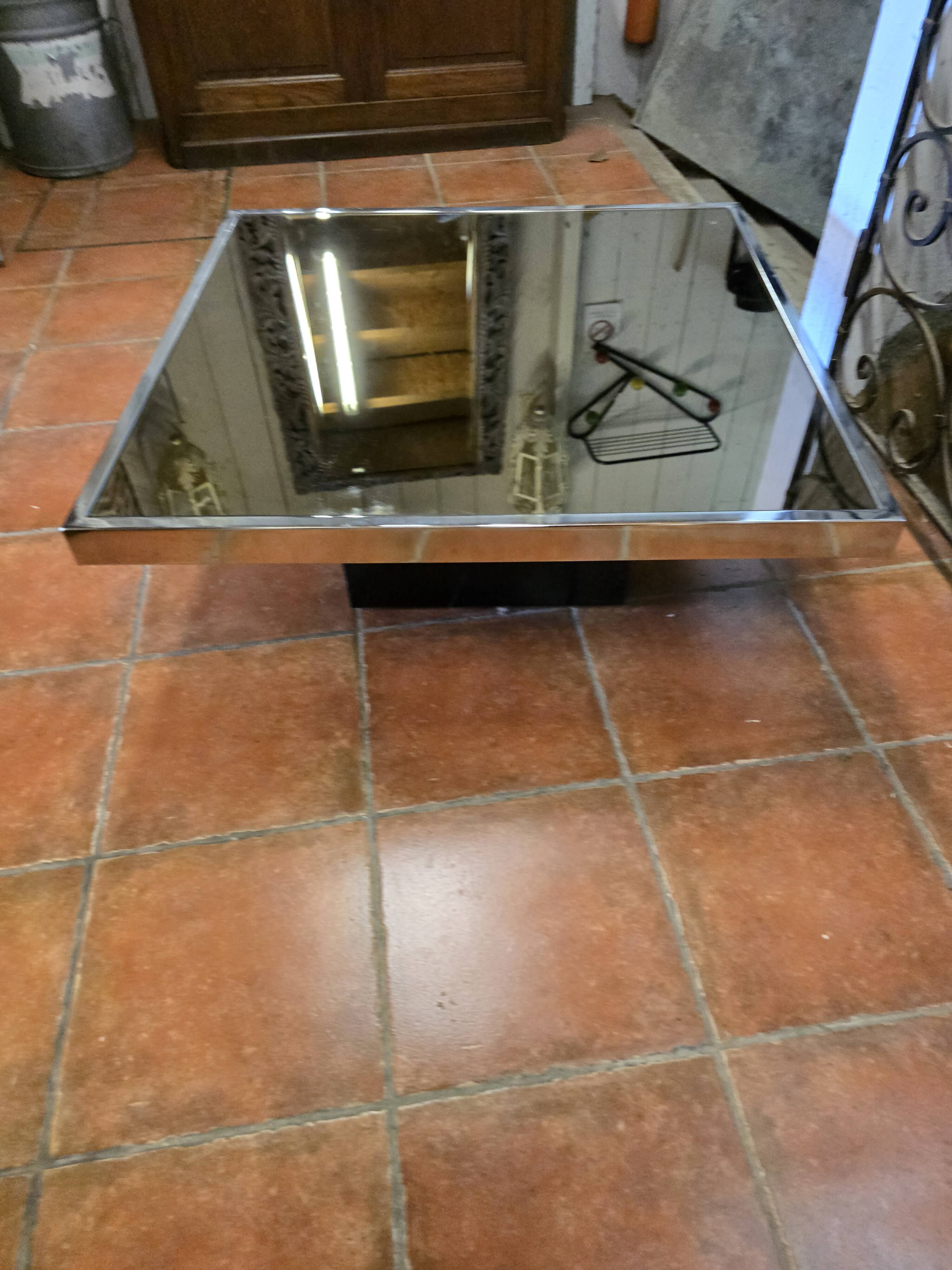 Chrome coffee table with smoked mirror top