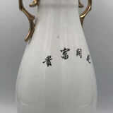 Vase in asian porcelain decorated with birds