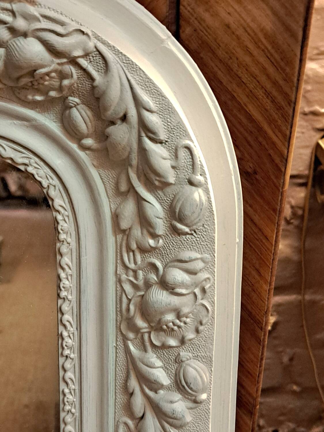 Louis Philippe mirror with patinated cartouche