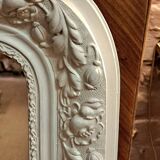 Louis Philippe mirror with patinated cartouche