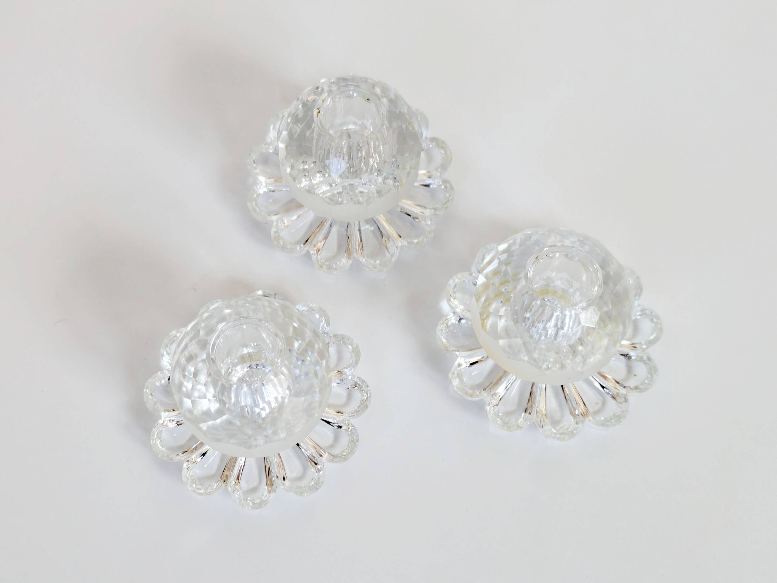 Lot of 3 vintage faceted crystal candle holders with flower base for slim candles.