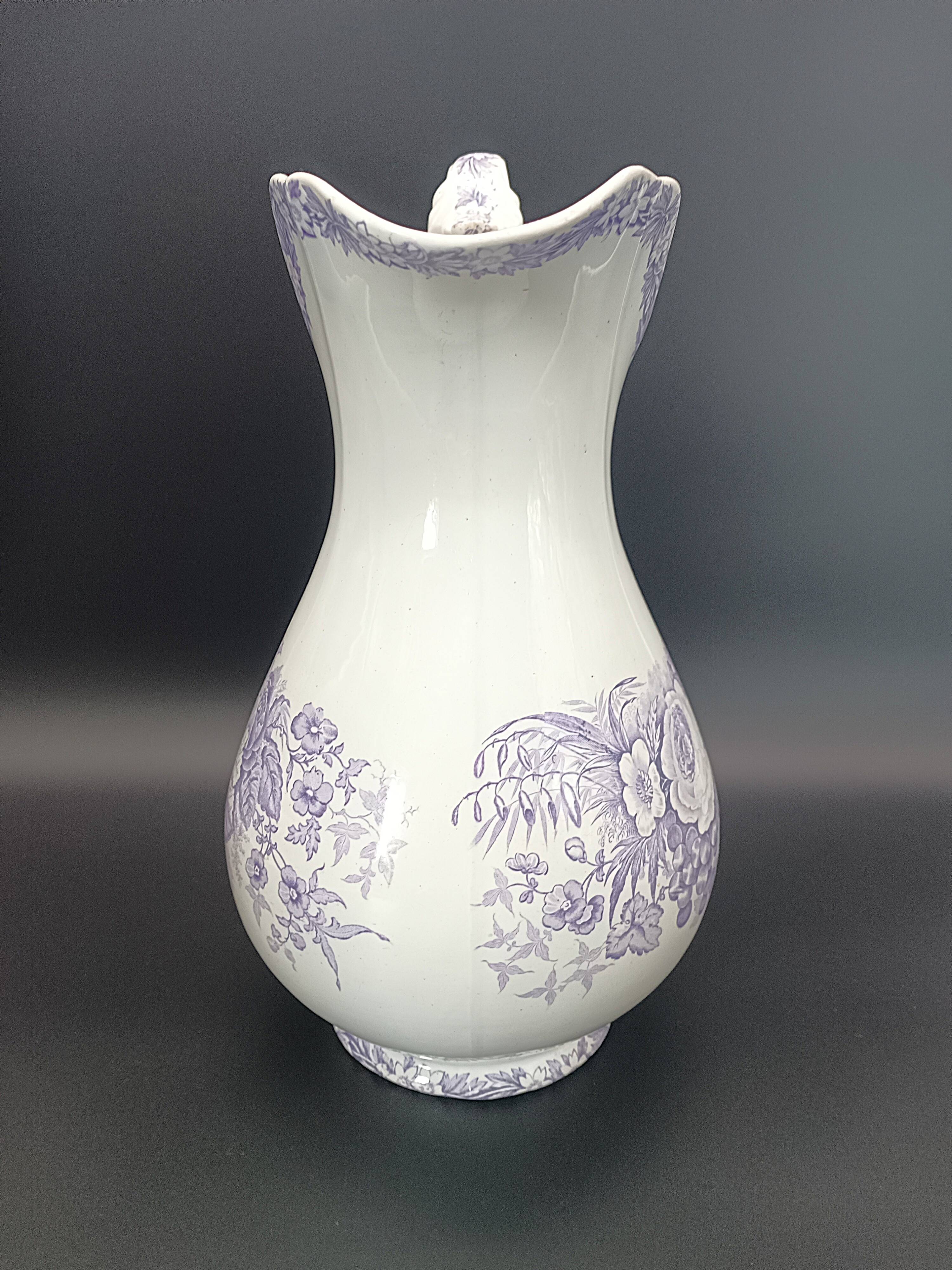 Large antique toilet bowl by Jules Vieillard Bordeaux with violet floral decoration.