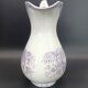 Large antique toilet bowl by Jules Vieillard Bordeaux with violet floral decoration.