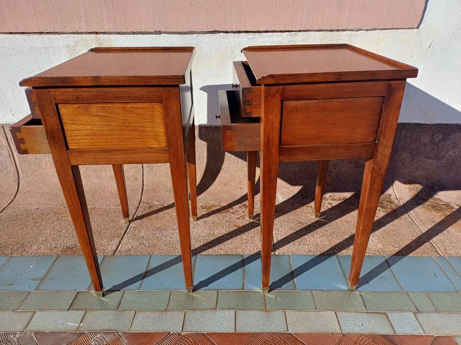 Pair of Louis XVI style oak bedside tables with 2 drawers and spindle legs