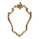 Louis XV Style wood and gilded stucco mirror with animated shape