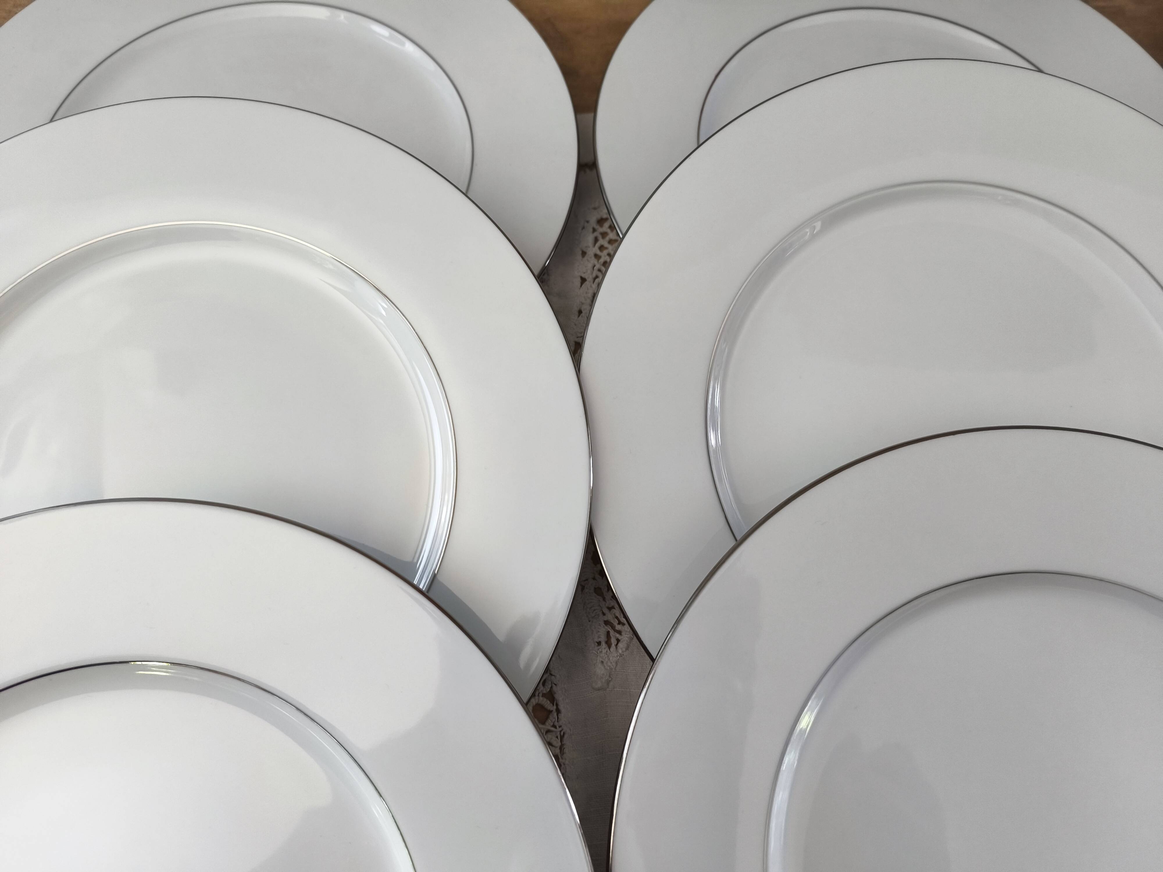 Set of 12 white porcelain dinner plates with double silver rim