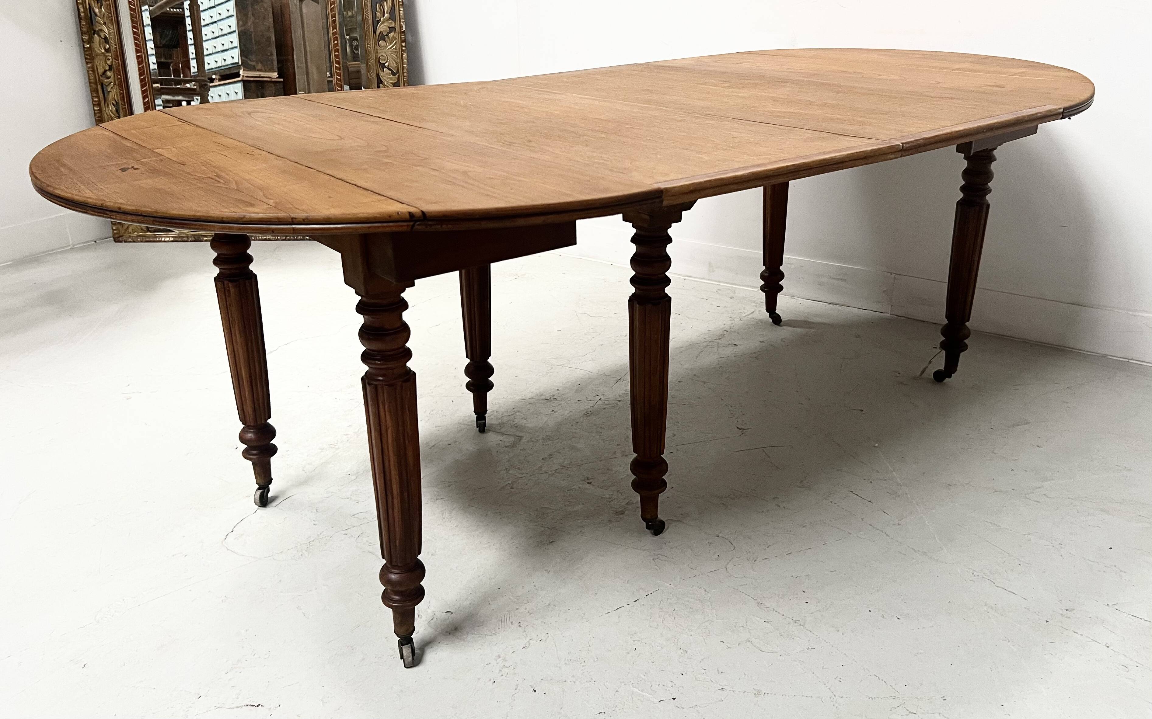 Louis Philippe six-legged table in solid cherry wood, 19th century