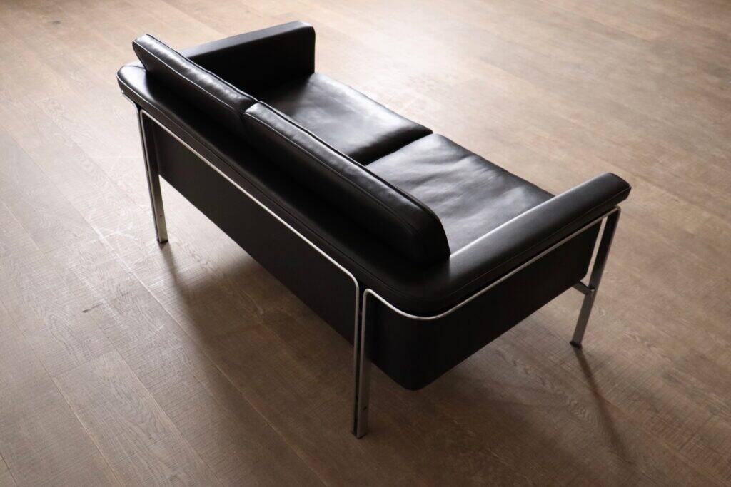 Horst Brüning Model 6912 two seater sofa in black leather for Kill International, Germany 1967