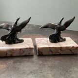Pair of marble bookends with bronze birds