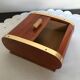 Vintage wooden cigarette box and brass curtain sliding lid