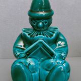 Pair of Art-Deco BookEnd Clowns drowsy in front of a book - glazed ceramics - 1930/1940