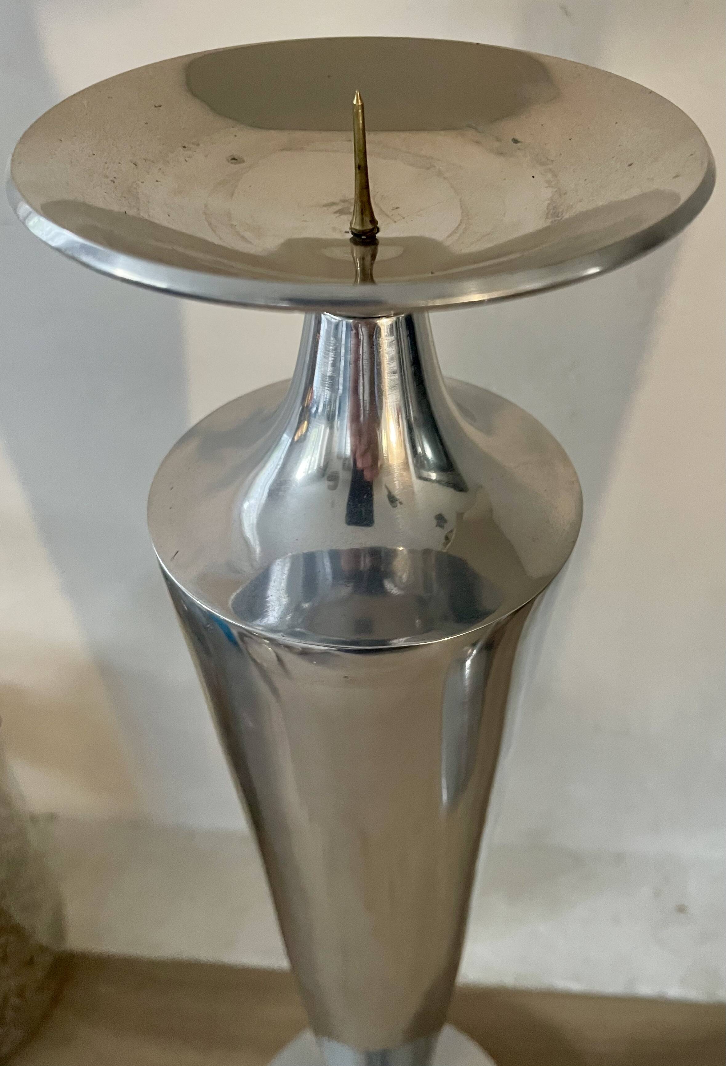 Pair of aluminium cast candle holders 52cm