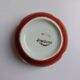 Red bowl with white polka dots in Longchamp ceramic