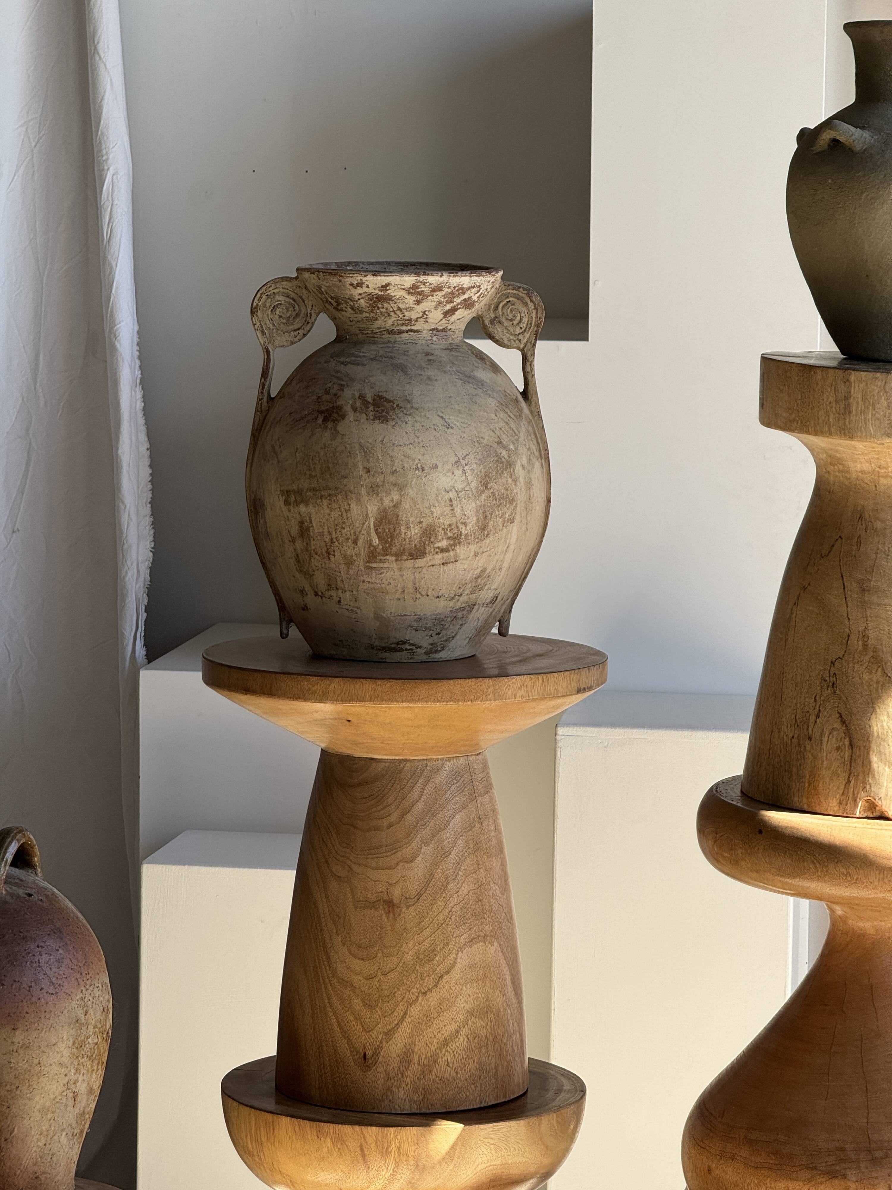 Natural solid mango side table (monoxyle) with conical legs.