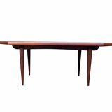 Vintage Scandinavian dining table from the 1960s, extendable, made of rosewood.