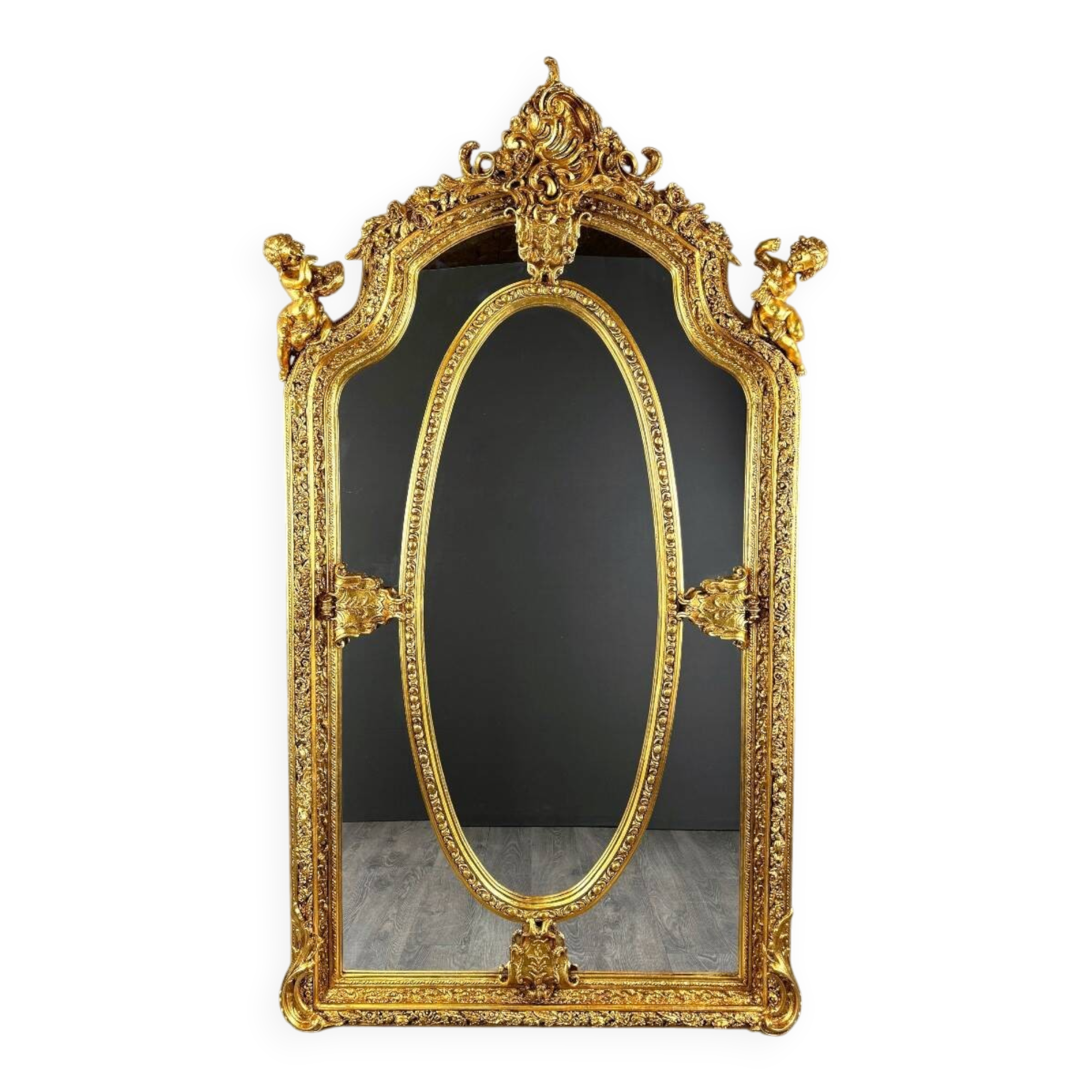 Grand miroir style Louis XV en bois sculpté et doré, XIXe siècle