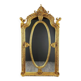 Grand miroir style Louis XV en bois sculpté et doré, XIXe siècle