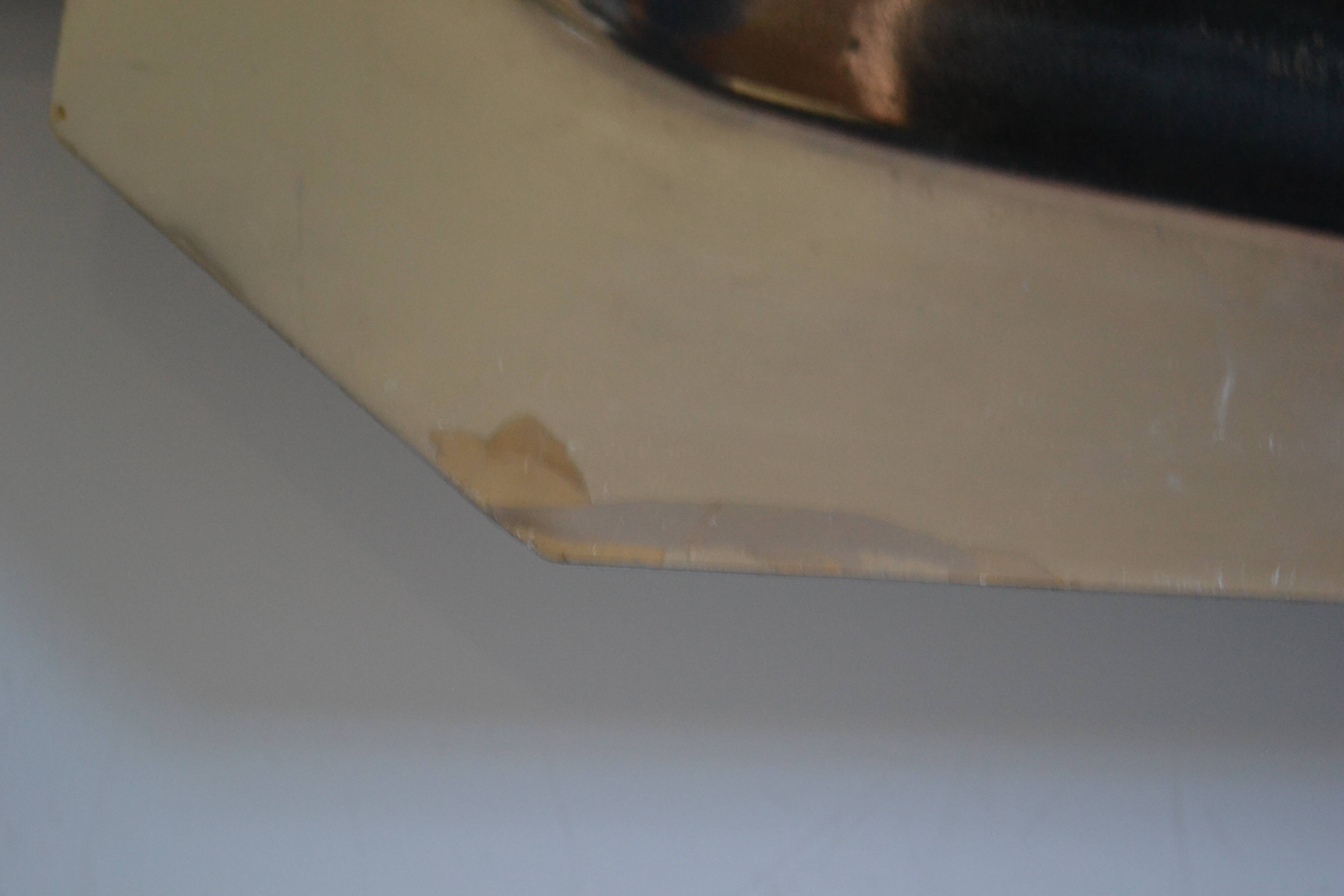 Art Deco serving dish in chrome metal with ebony handles.