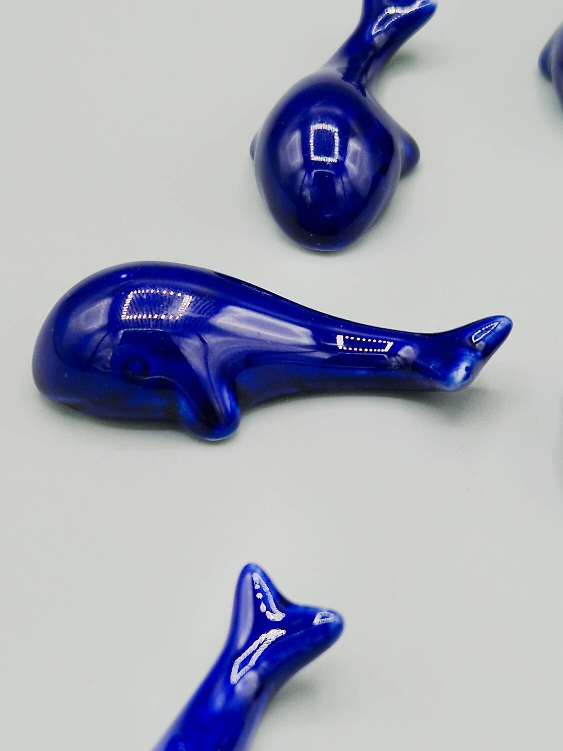Set of 6 vintage blue porcelain whale knife rests.