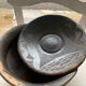 Black ceramic plate or fired in oxygen reduction.