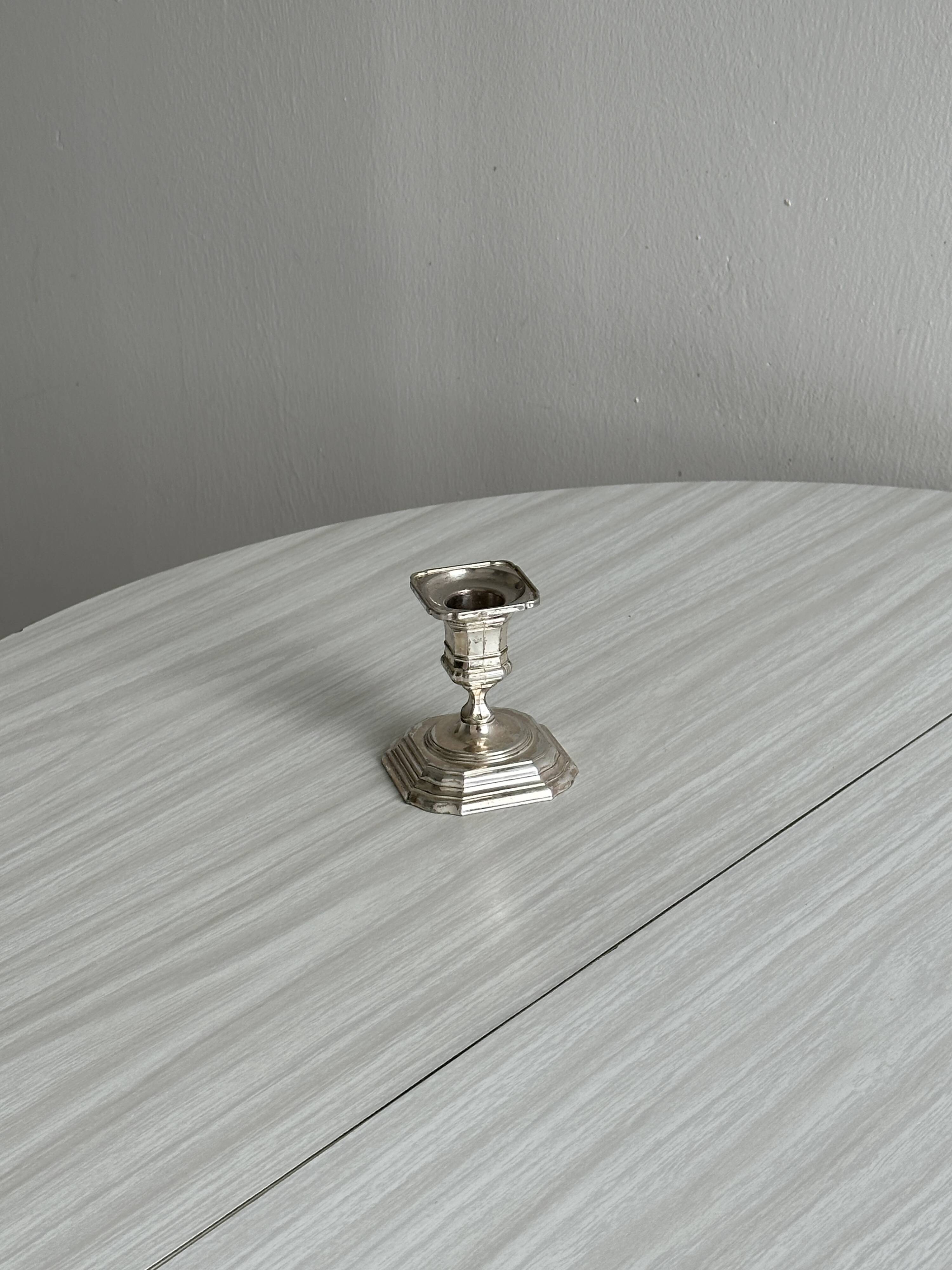 Small antique metal candle holder