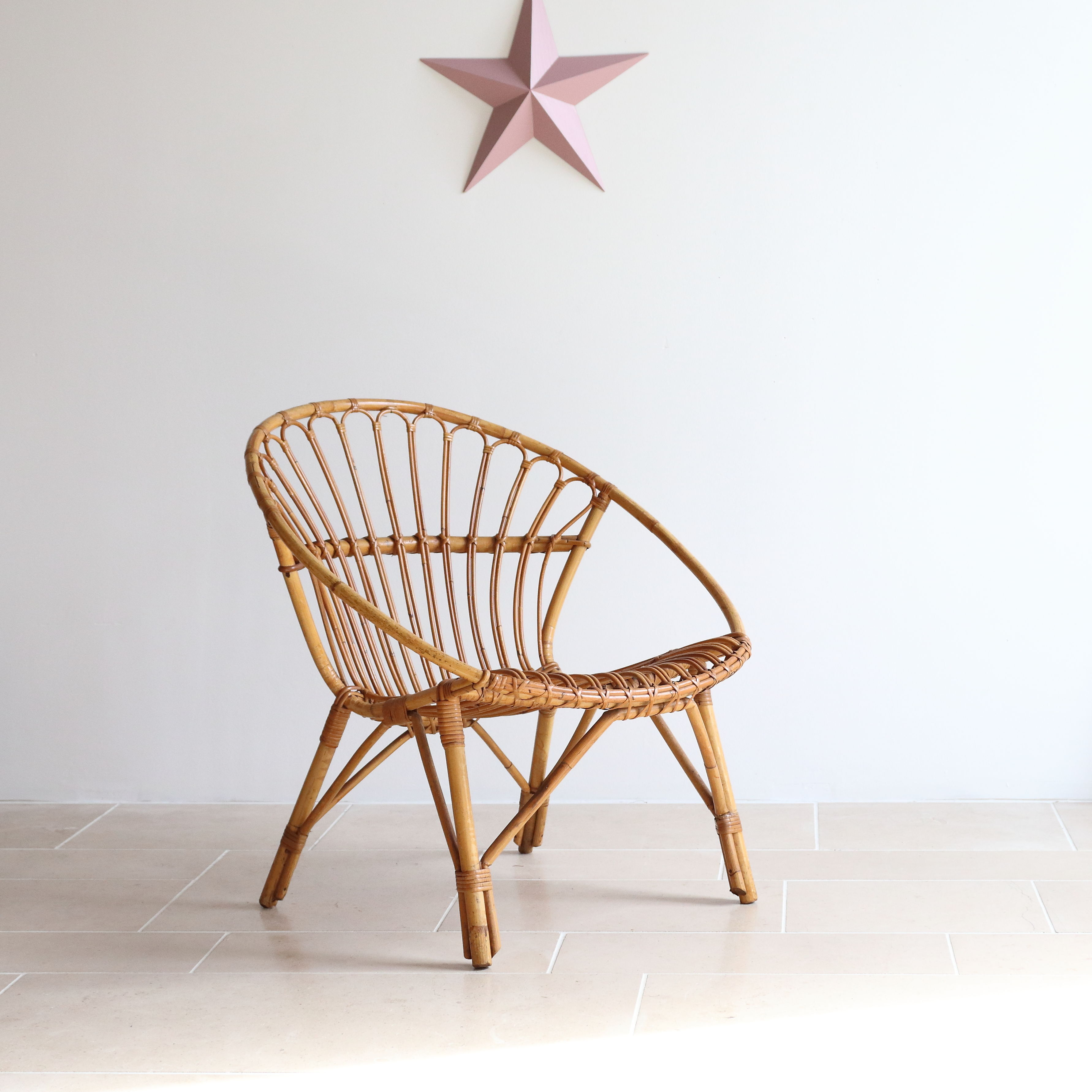 Adult size rattan shell armchair from the 60s