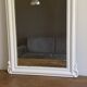 Mirror from the late 19th century with a decorated pediment. 112x66.