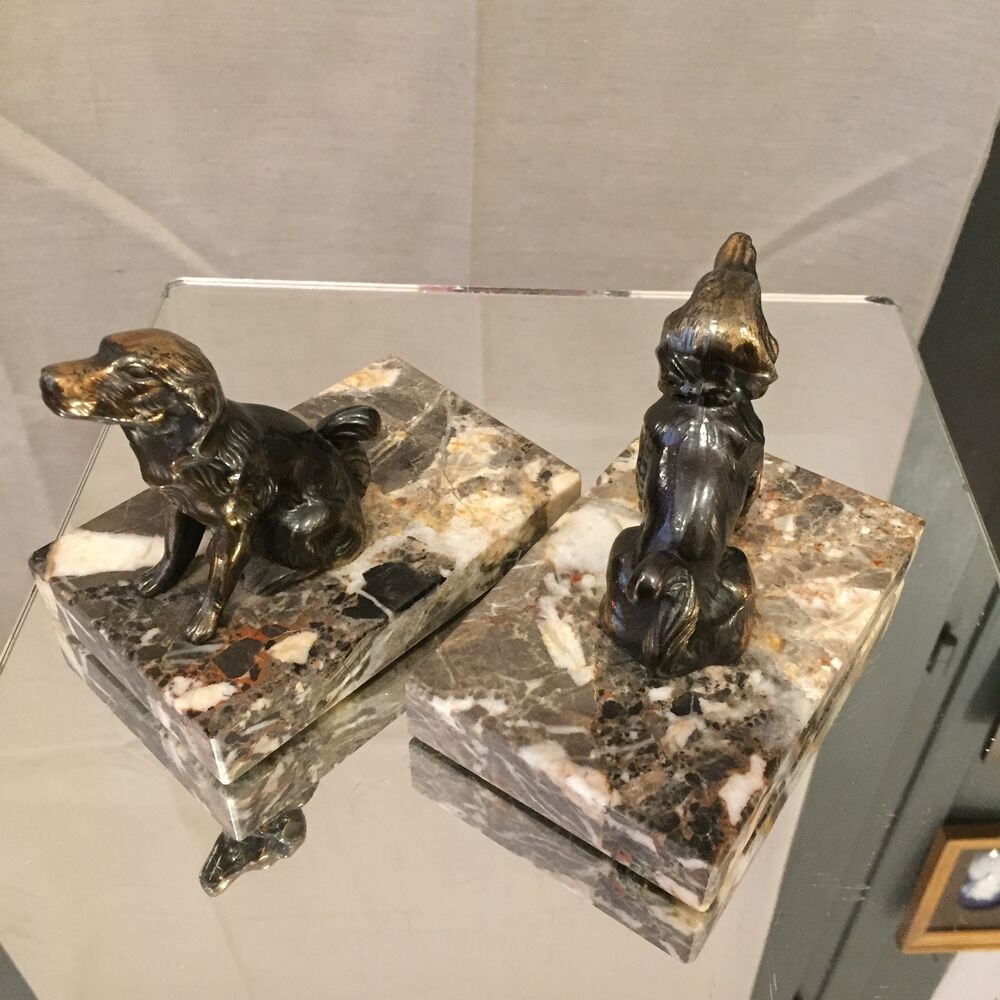 Pair of regular bookends representing dogs marble base